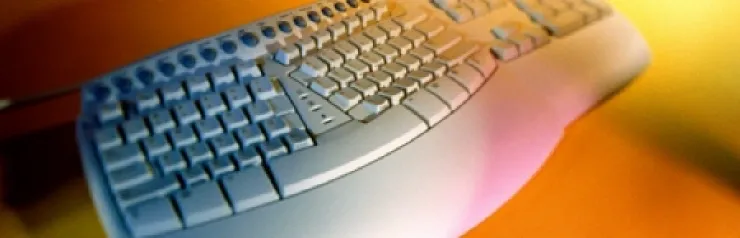 Ergonomic keyboard with colorful lighting effects.